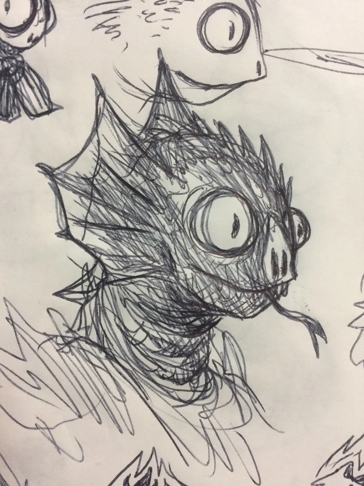 Croquis tête d'homme-lézard