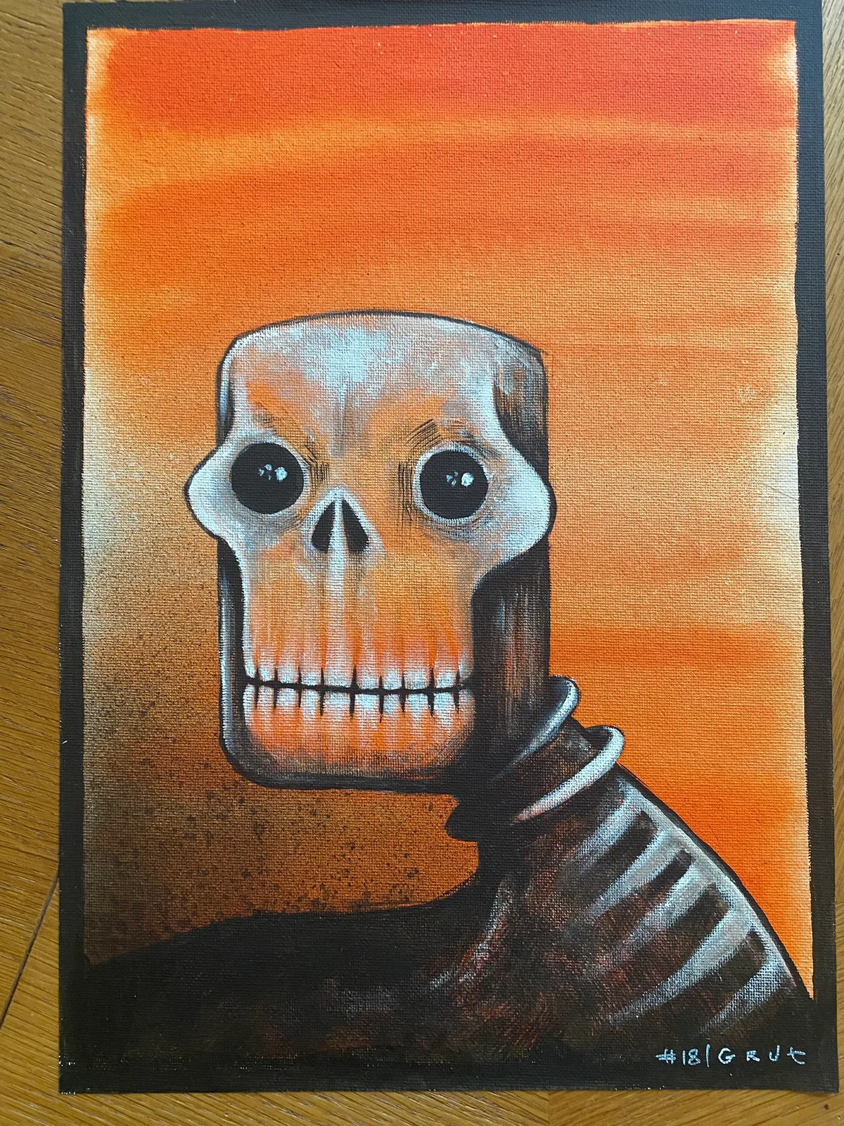 crâne orange sur toile de face